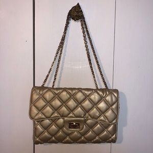 Metallic gold shoulder flap bag
